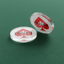 Two clear plastic buttons with red spade symbol and 'DEALER' text on a white background