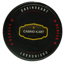 Black circular dealer button with 'Casinokart' branding on a white background