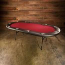 Poker table with red felt surface against a wooden wall.